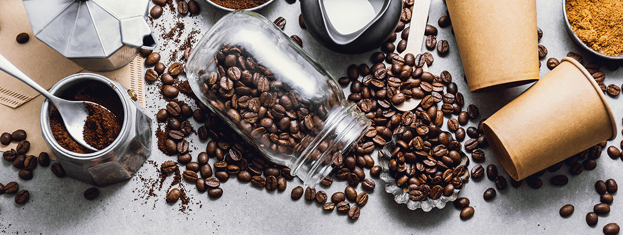 Roasted coffee beans queued for nitrogen-flushed bag, pod, and canning lines