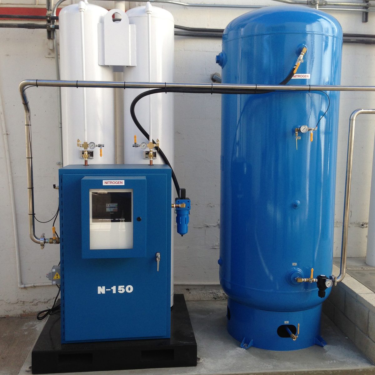 GGS N-150 nitrogen generator installed at a dairy and cheese packaging facility with a vertical receiver tank.